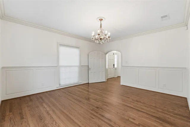 a view of a livingroom with wooden floor