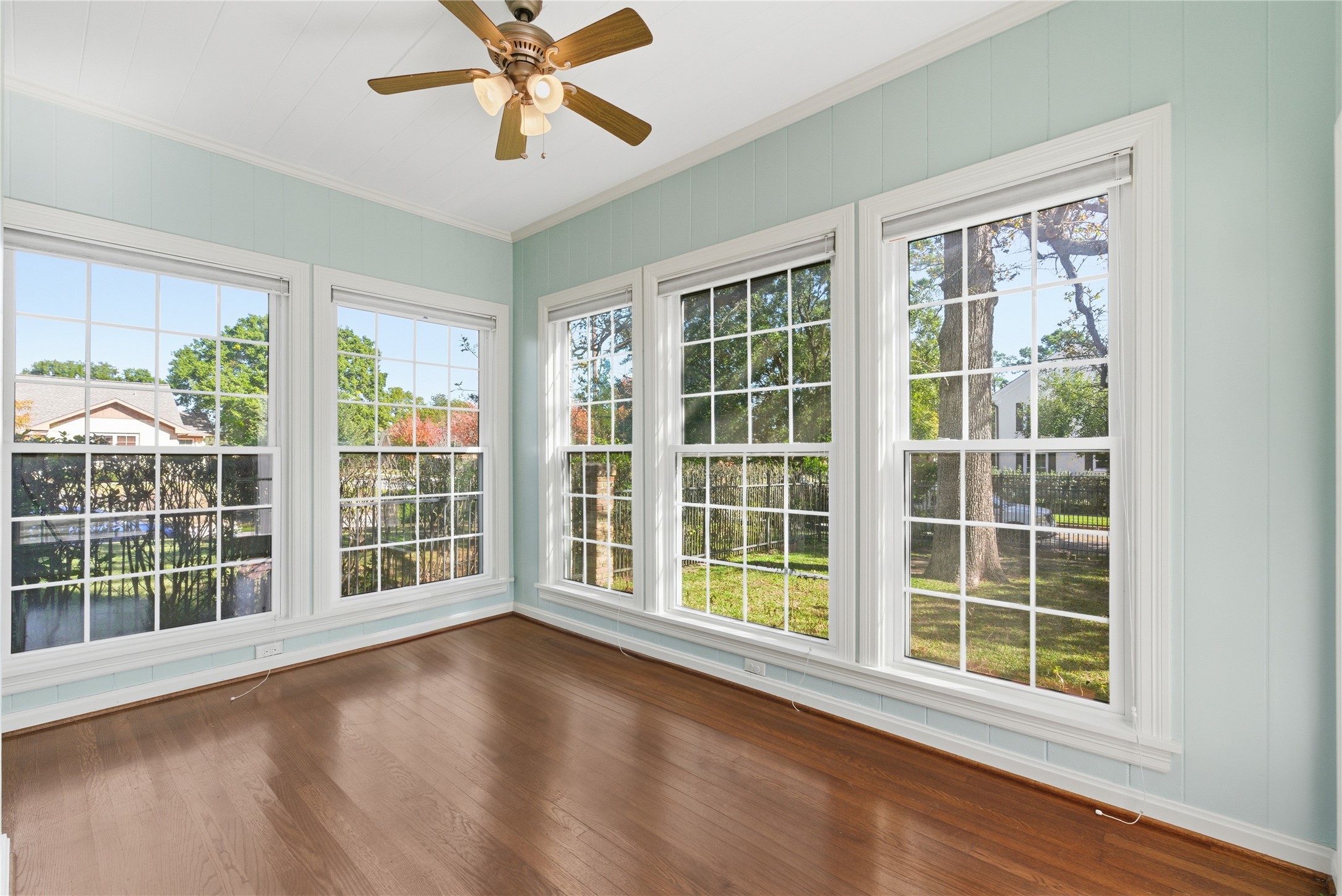 6666 Fairfield Street Houston, TX 77023 - Photo 20 of 48 a view of an empty room with a window and wooden floor
