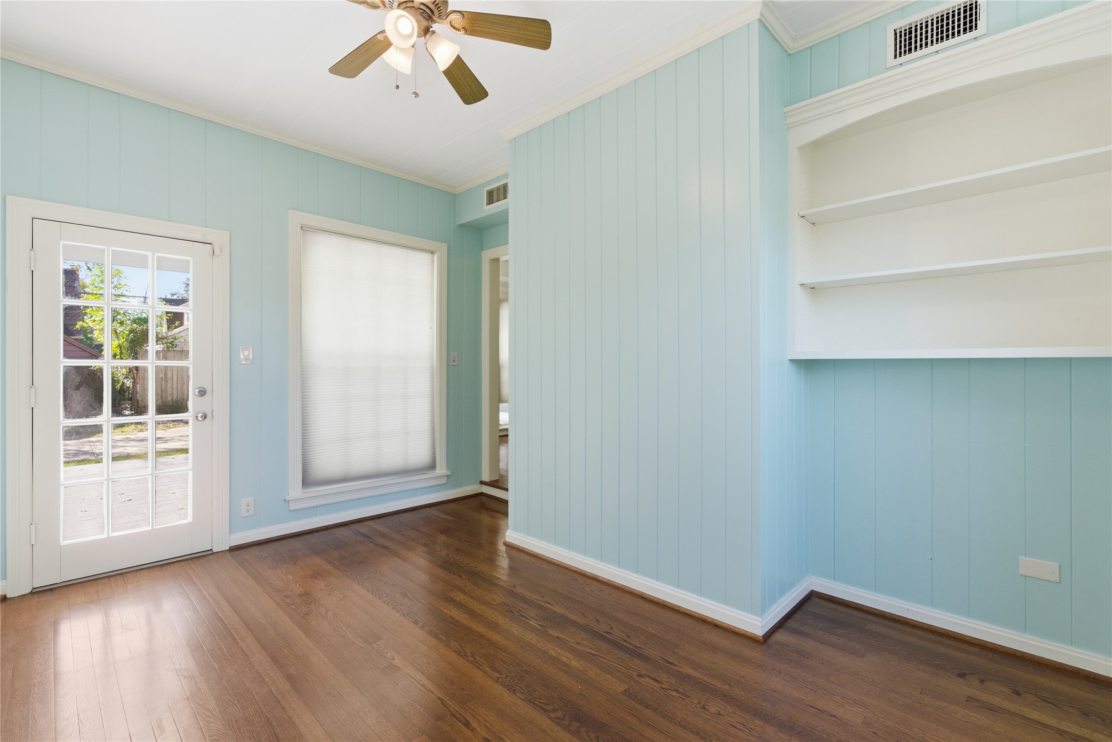 6666 Fairfield Street Houston, TX 77023 - Photo 21 of 48 wooden floor in an empty room with a window