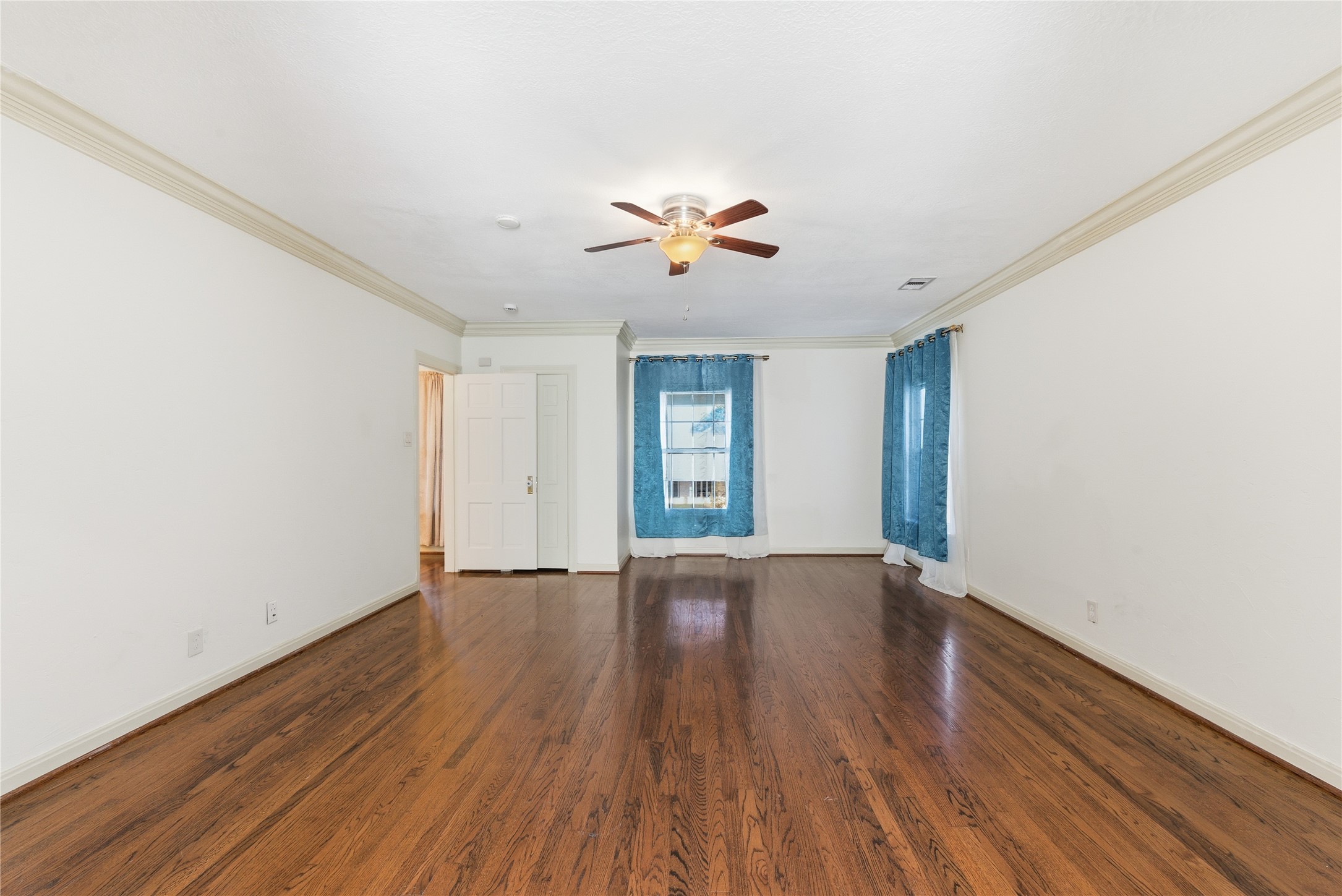 6666 Fairfield Street Houston, TX 77023 - Photo 32 of 48 wooden floor in an empty room with a window