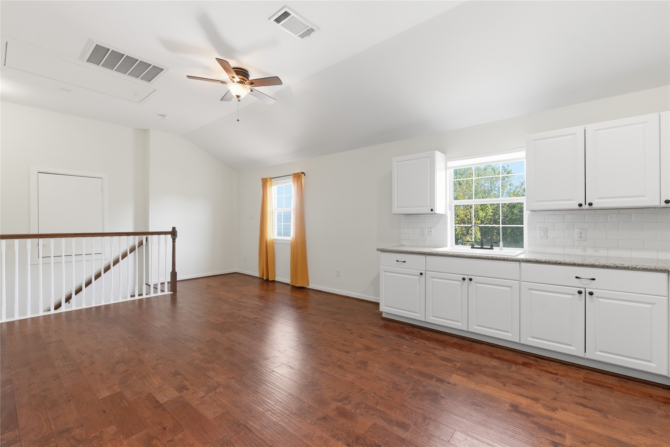 6666 Fairfield Street Houston, TX 77023 - Photo 41 of 48 a view of a kitchen with sink cabinets and wooden floor
