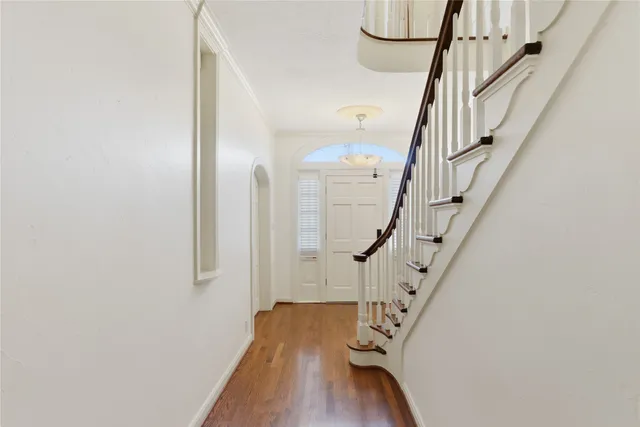 a view of entryway with wooden floor