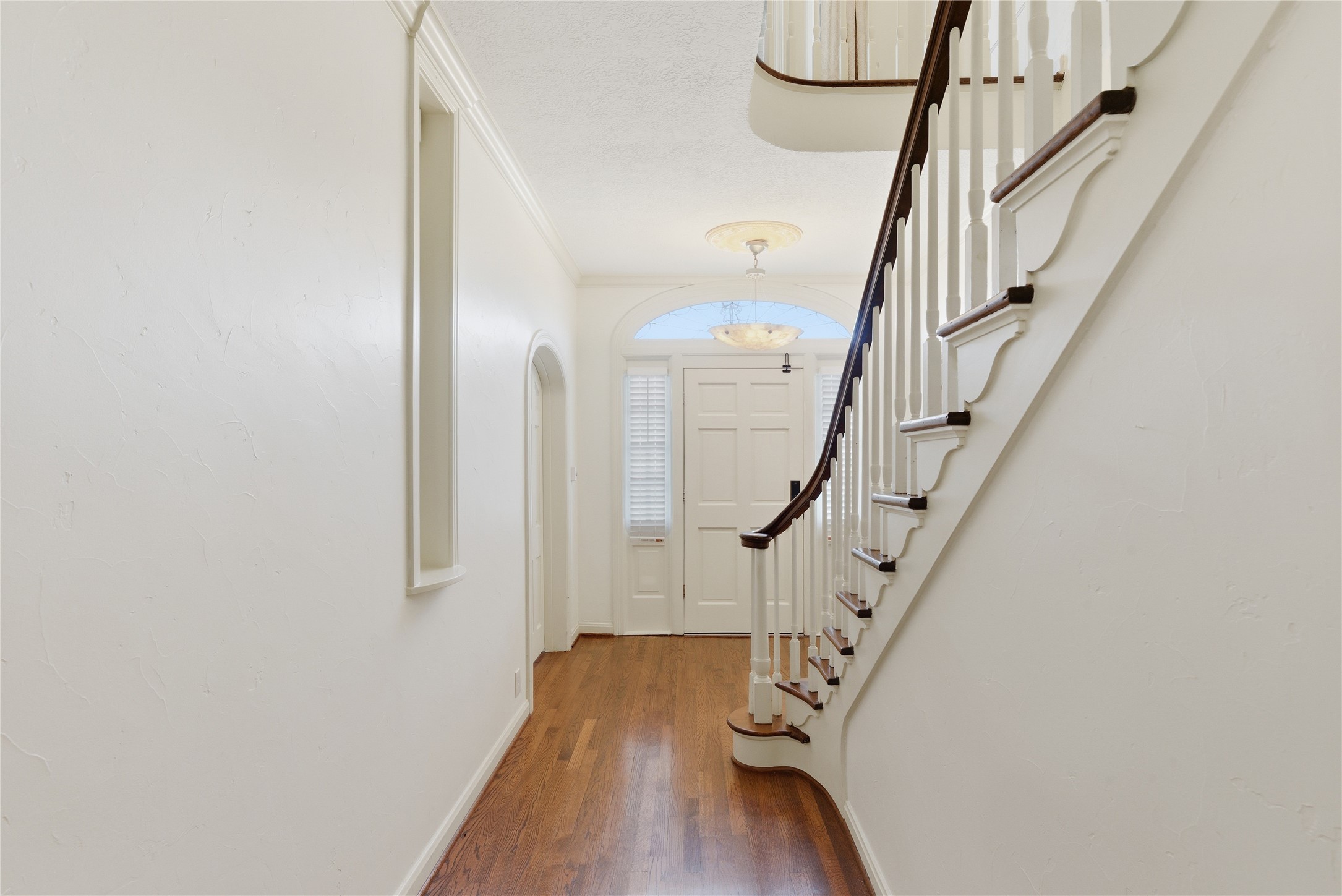 6666 Fairfield Street Houston, TX 77023 - Photo 6 of 48 a view of entryway with wooden floor