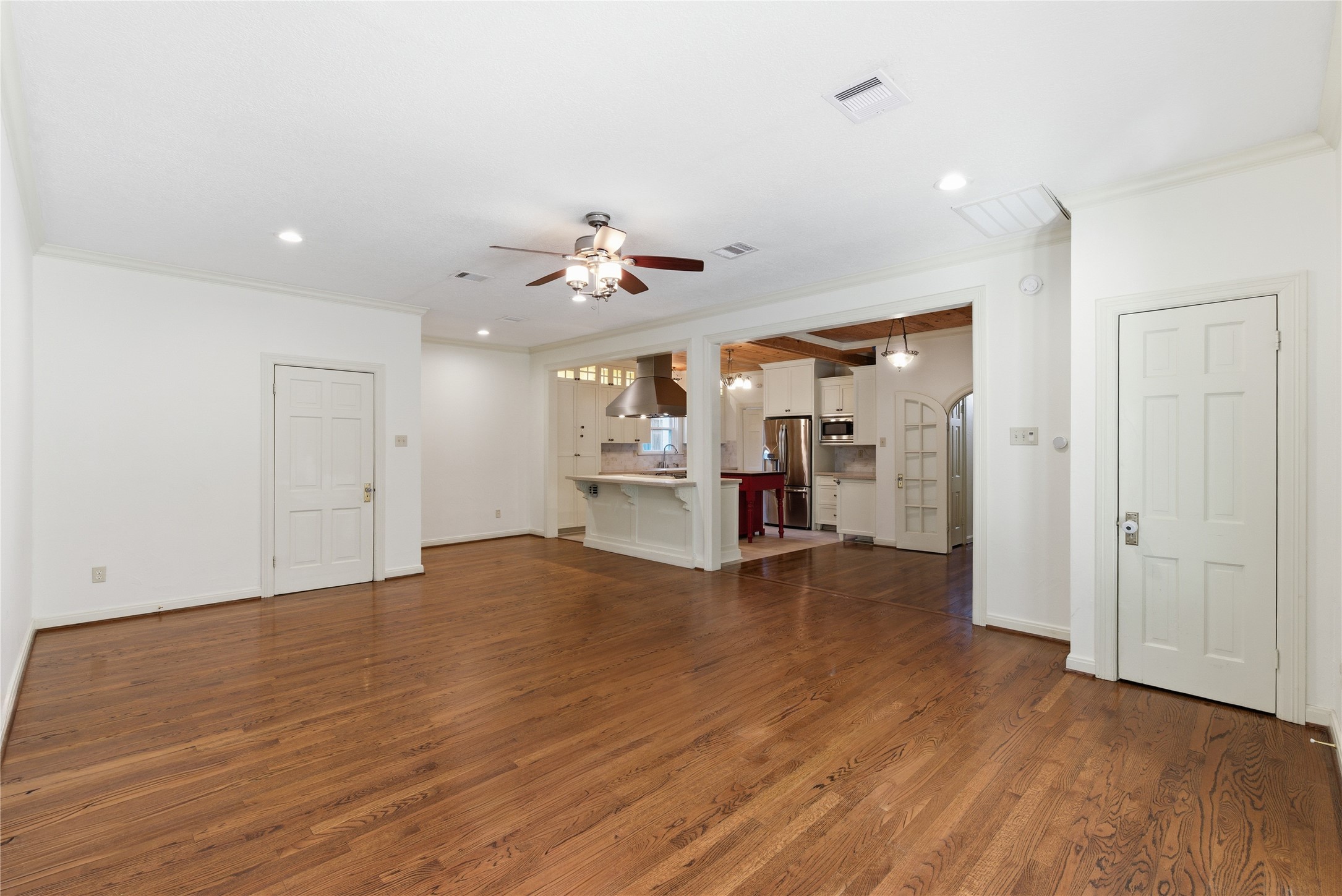 6666 Fairfield Street Houston, TX 77023 - Photo 10 of 48 a view of a livingroom with a furniture and wooden floor