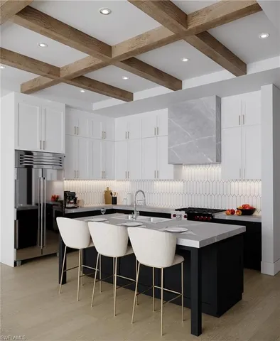 a kitchen with a table and chairs in it