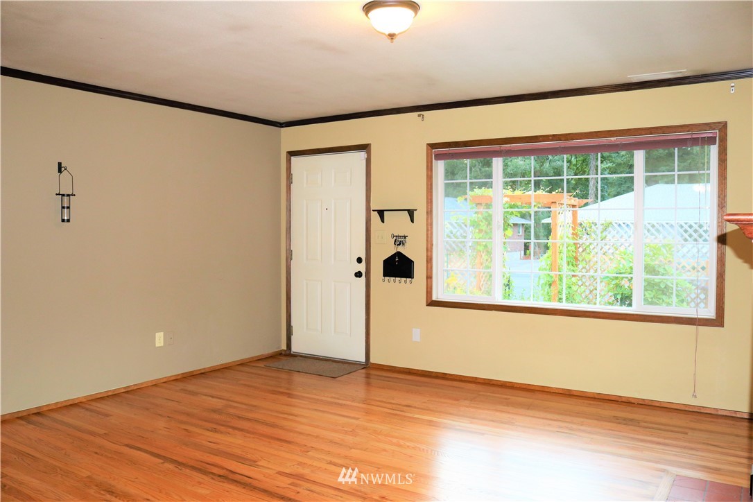 8325 Custer Road Southwest Lakewood, WA 98499 - Photo 5 of 20 a view of a room with a large window