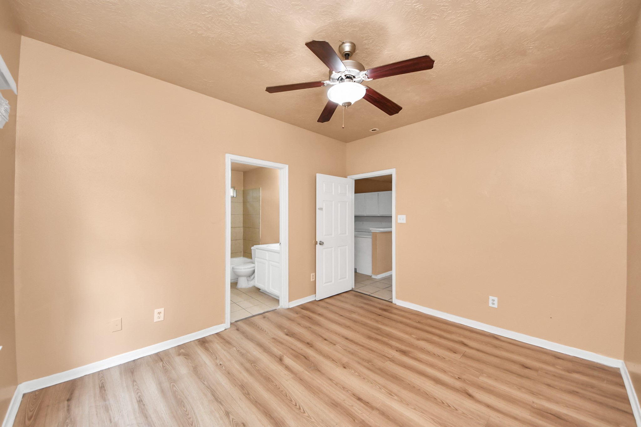 8130 Jutland Road Houston, TX 77033 - Photo 25 of 47 a view of a room with wooden floor and bathroom