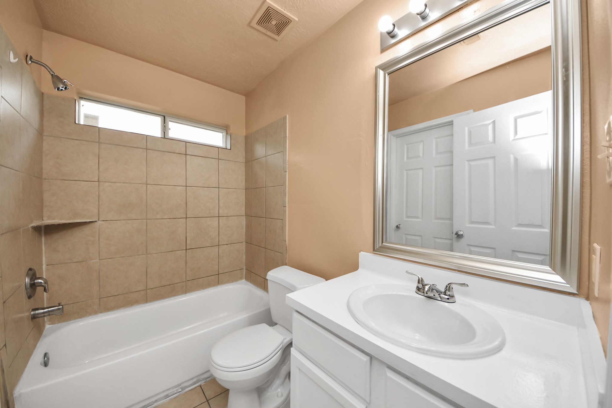 8130 Jutland Road Houston, TX 77033 - Photo 26 of 47 a bathroom with a sink toilet and shower