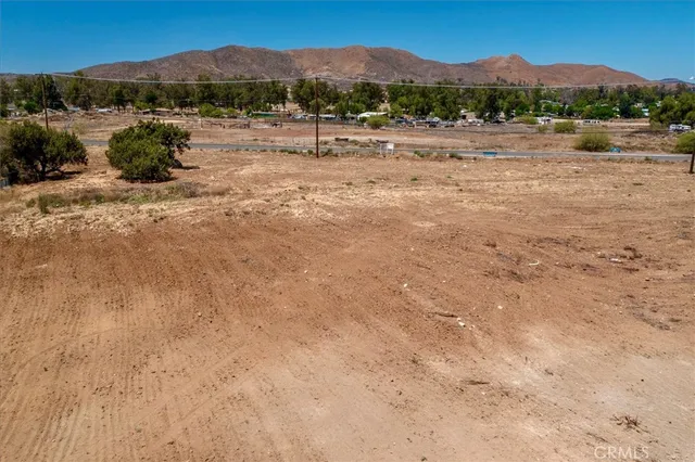 a view of a road with a yard