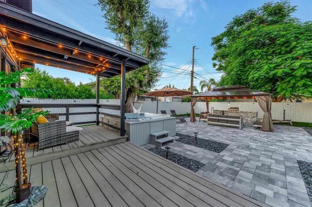 2925 24th Street North St. Petersburg, FL 33713 - Photo 2 of 33 a view of backyard with a deck and wooden floor
