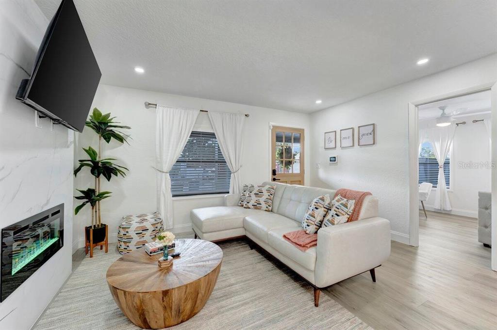 2925 24th Street North St. Petersburg, FL 33713 - Photo 21 of 33 a living room with furniture and a flat screen tv