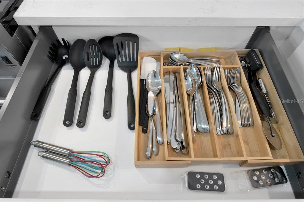 2925 24th Street North St. Petersburg, FL 33713 - Photo 25 of 33 a view of walk in closet with clothes and shoes