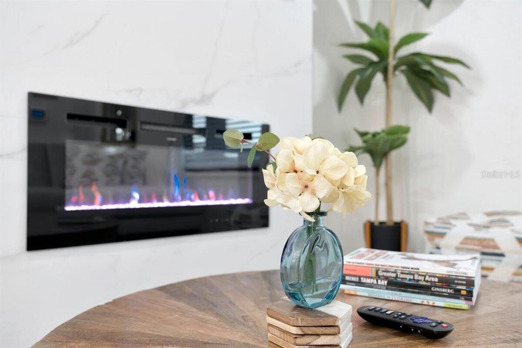 2925 24th Street North St. Petersburg, FL 33713 - Photo 7 of 33 a vase of flowers sitting on a table