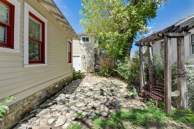 a backyard of a house with lots of green space