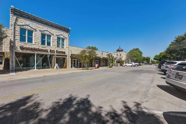 a view of street with houses