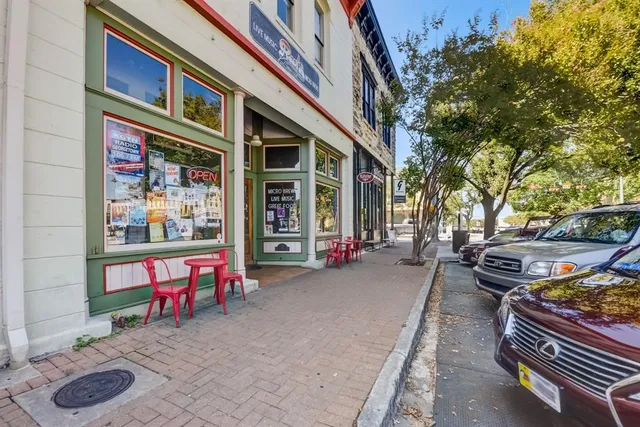 a view of a chairs and tables in the patio