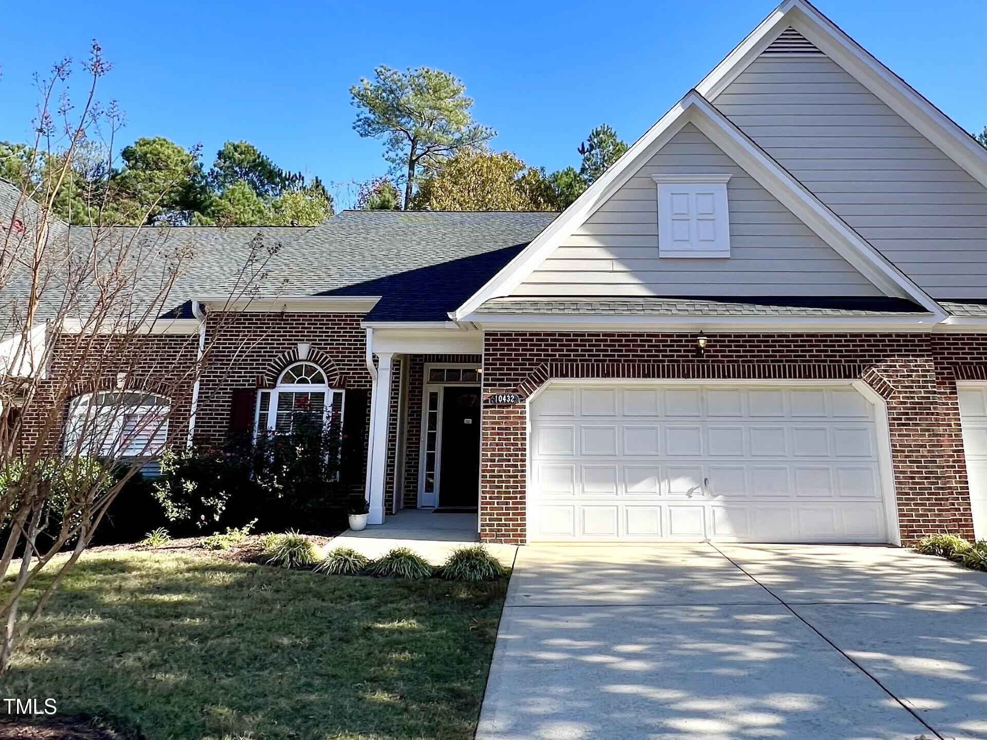 10432 Dapping Drive Raleigh, NC 27614 - Photo 1 of 11 a front view of a house with garden