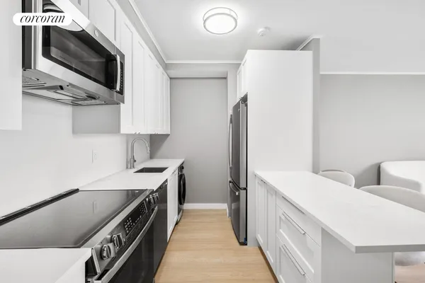 a room with furniture and a wooden floor