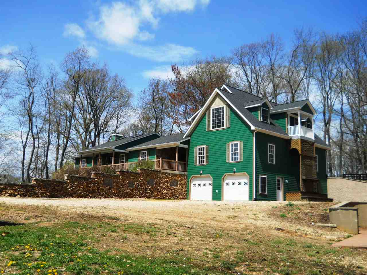 2938 Middlebrook Road Staunton, VA 24401 - Photo 1 of 38 a front view of a house with a yard and garage
