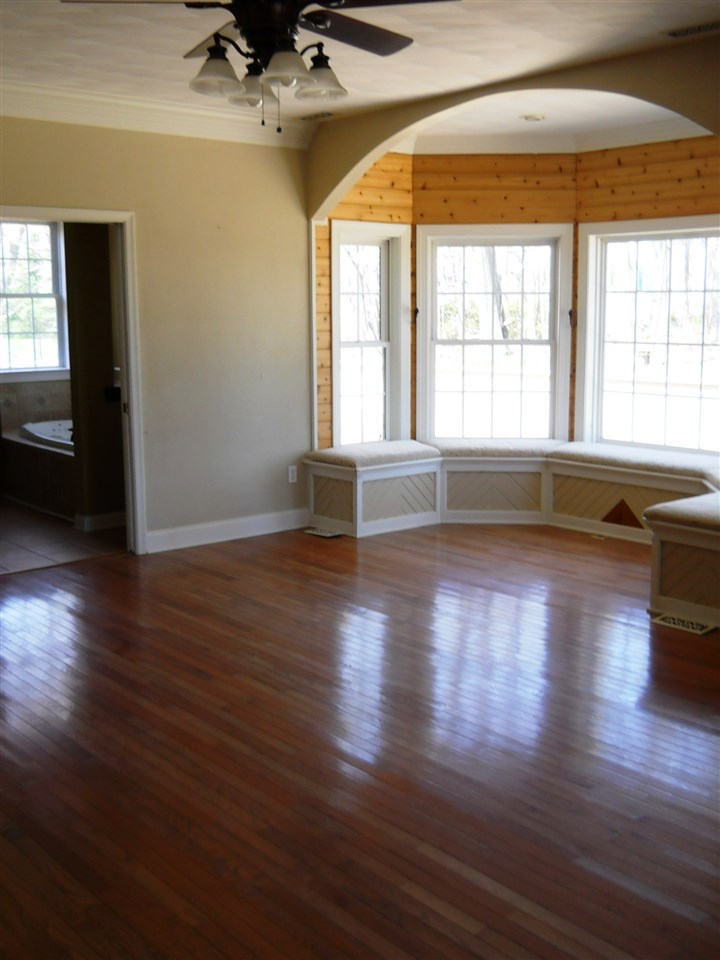 2938 Middlebrook Road Staunton, VA 24401 - Photo 20 of 38 an empty room with wooden floor and windows