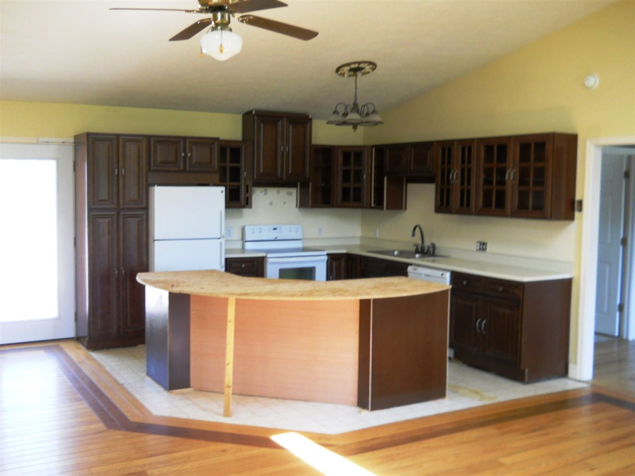 2938 Middlebrook Road Staunton, VA 24401 - Photo 24 of 38 a kitchen with stainless steel appliances granite countertop a sink a stove and a refrigerator