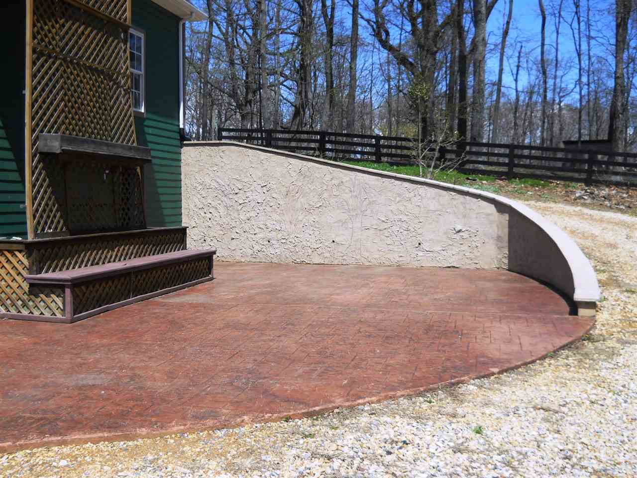 2938 Middlebrook Road Staunton, VA 24401 - Photo 25 of 38 a view of backyard with wooden fence and a bench