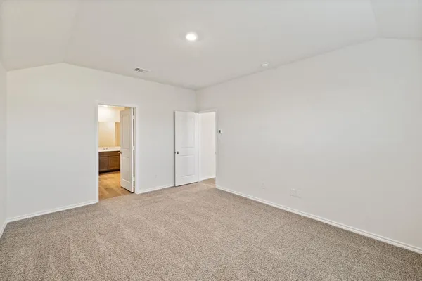 a bathroom with a sink a mirror and a shower