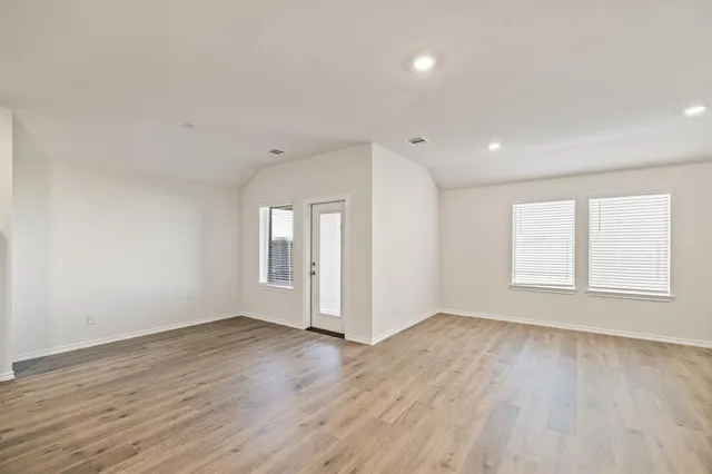 a kitchen with stainless steel appliances a sink stove and refrigerator
