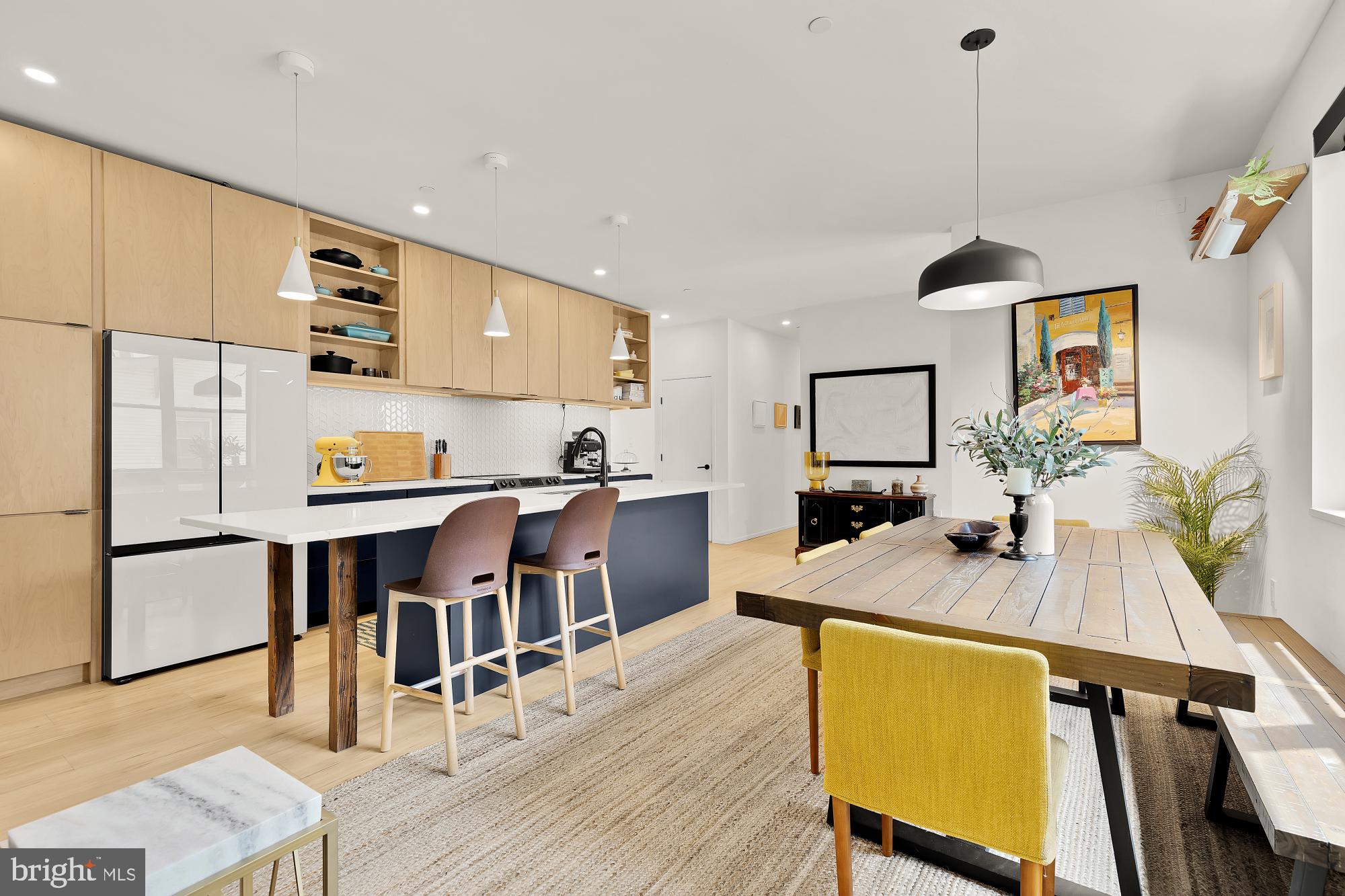 4020 35th Street, Unit B Mount Rainier, MD 20712 - Photo 1 of 42 a kitchen with stainless steel appliances granite countertop sink microwave and wooden floor