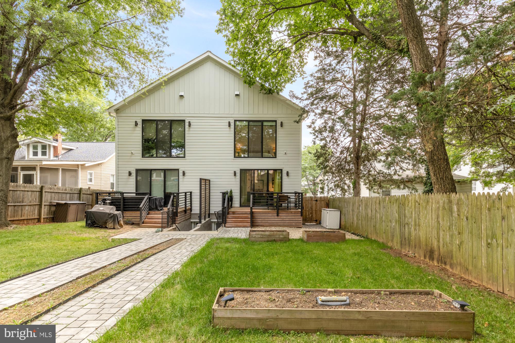 4020 35th Street, Unit B Mount Rainier, MD 20712 - Photo 15 of 42 a view of a house with garden and sitting area