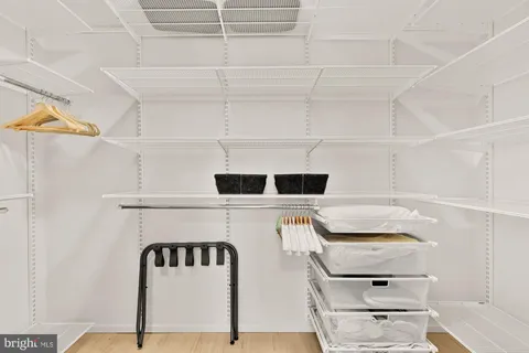 a refrigerator freezer sitting inside of a kitchen