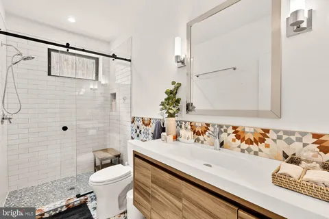 a bathroom with a sink and a toilet