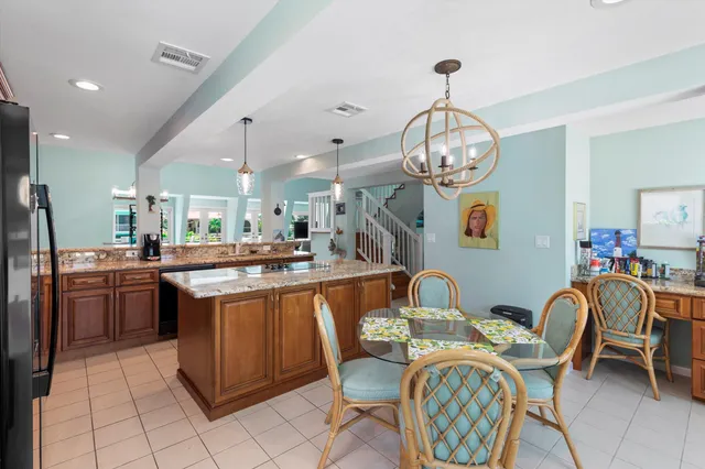 a bedroom with a bed and a ceiling fan