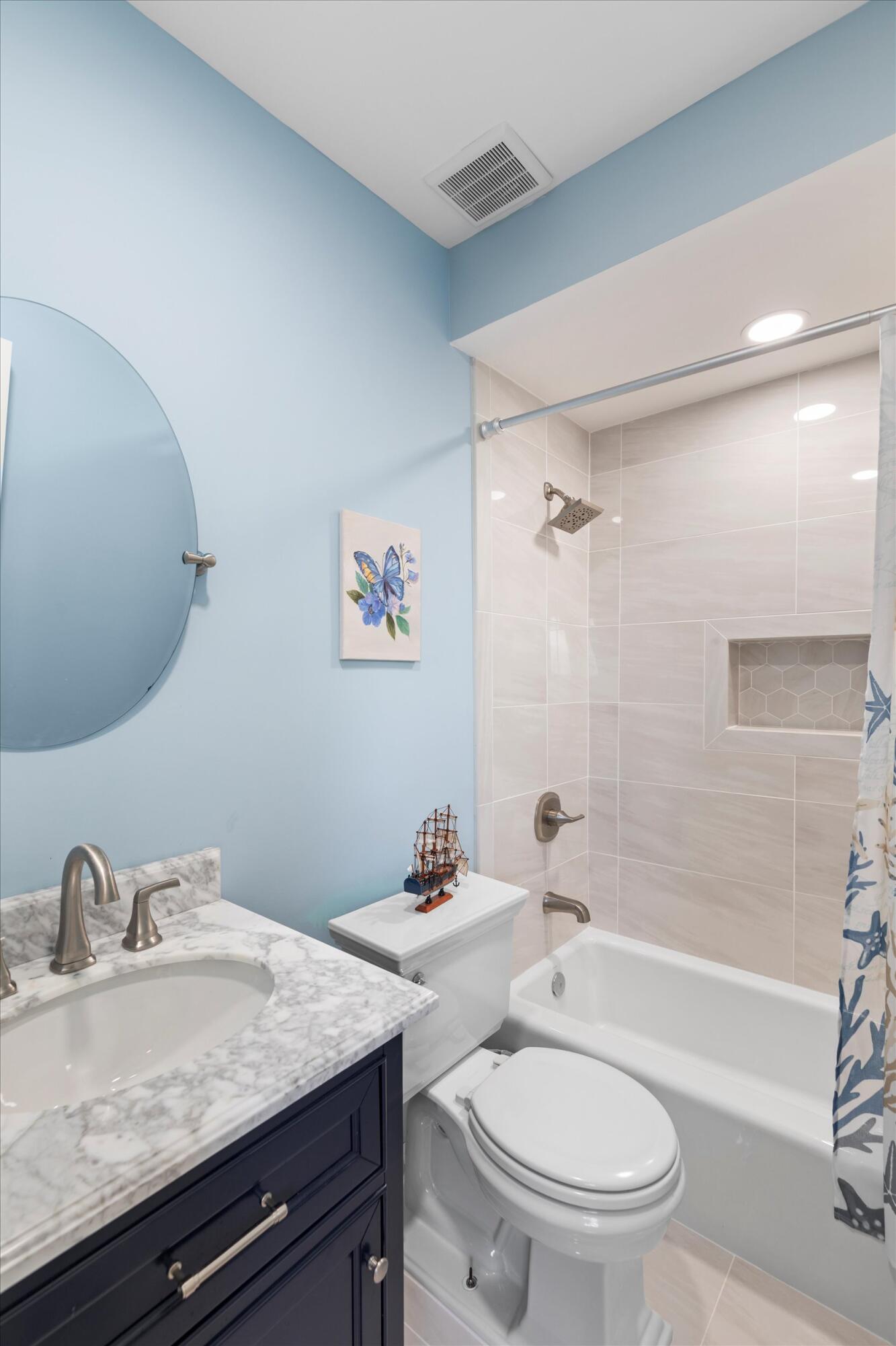 680 Cruikshank Lane Summerland Key, FL 33042 - Photo 47 of 101 a bathroom with a granite countertop sink a toilet and shower
