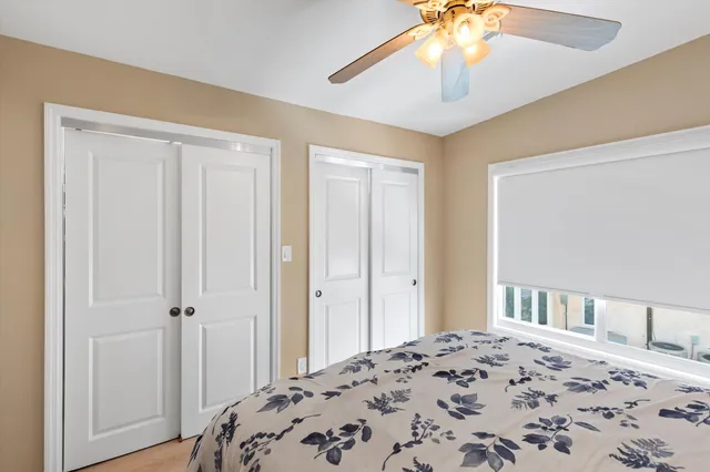 an aerial view of a house with outdoor space swimming pool