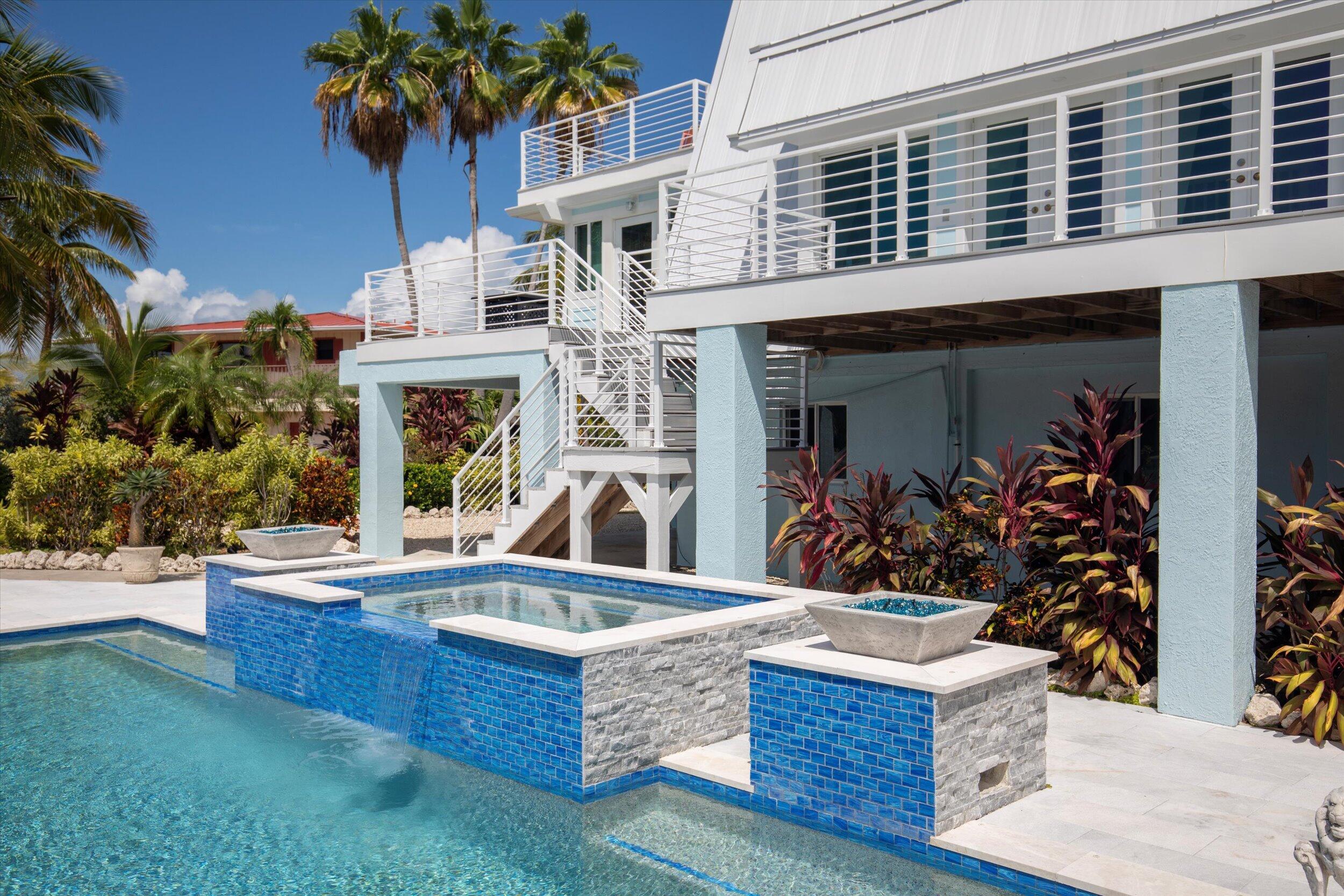 680 Cruikshank Lane Summerland Key, FL 33042 - Photo 61 of 101 a view of house that has a fountain