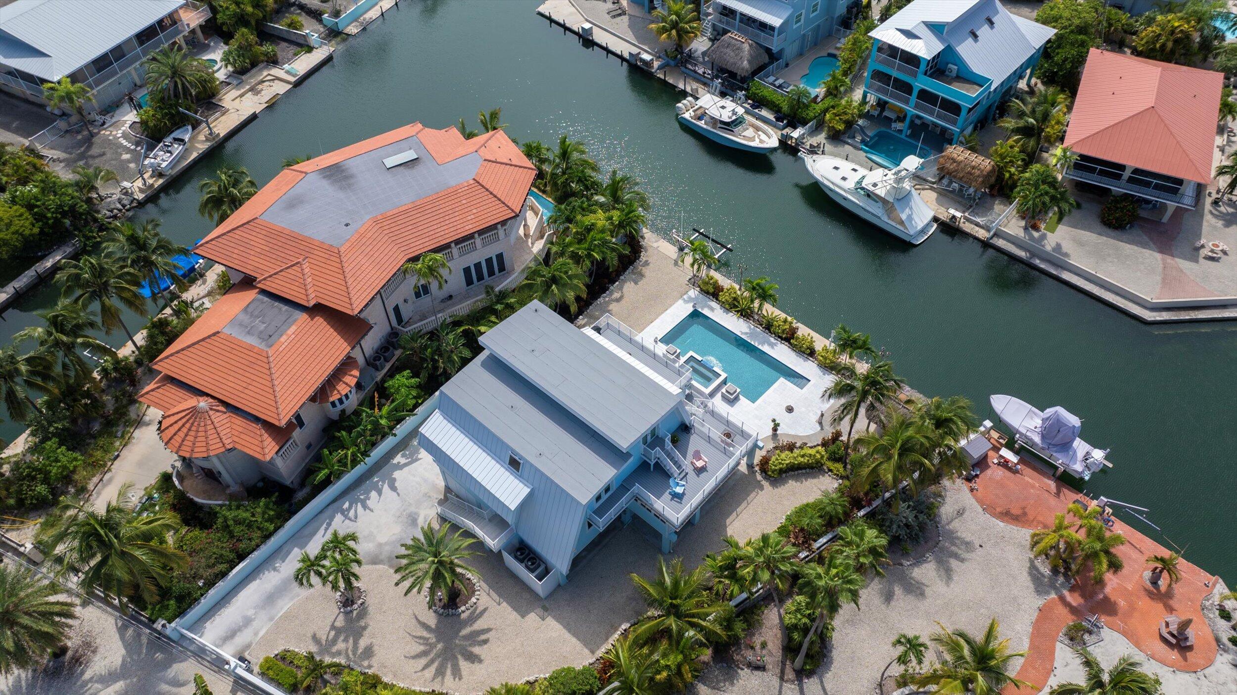 680 Cruikshank Lane Summerland Key, FL 33042 - Photo 81 of 101 an aerial view of a house with a lake view