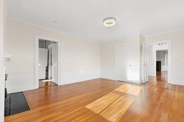 a view of a livingroom with wooden floor