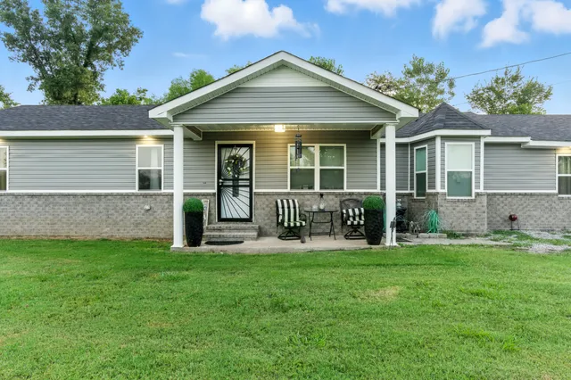 front view of a house with a yard
