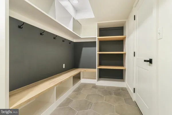 a view of an empty walk in closet