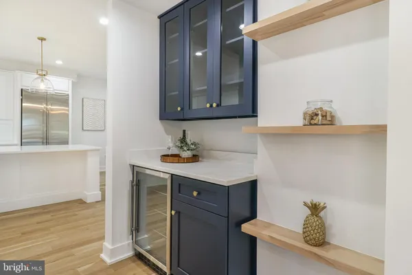 a bathroom with a sink a mirror and a toilet