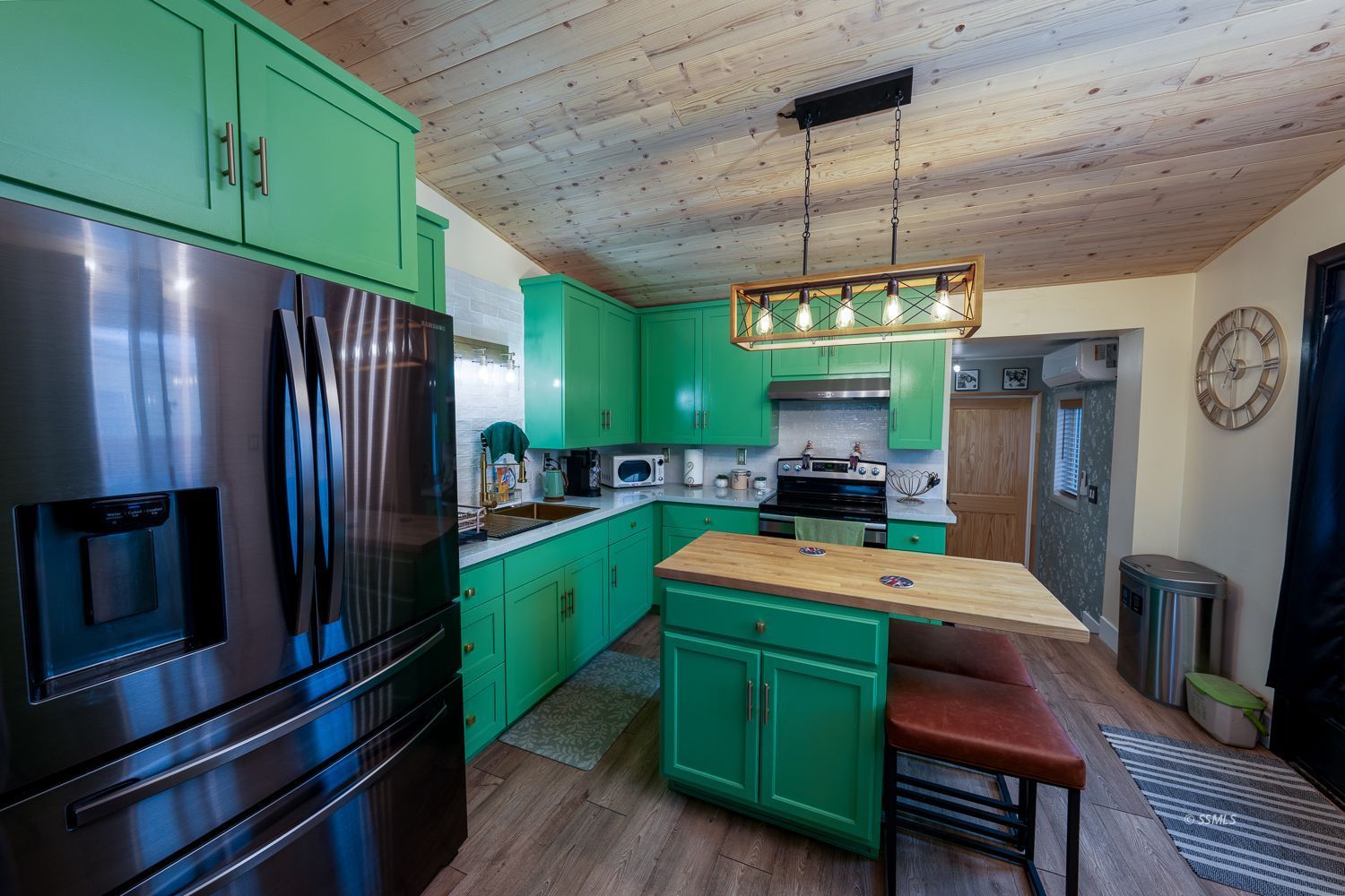 413 North Helena Street Ridgecrest, CA 93555 - Photo 6 of 42 a kitchen with cabinets and a refrigerator