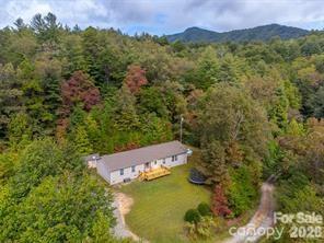 179 Fresh Water Rdg Road Whittier, NC 28789 - Photo 43 of 48 an aerial view of a house with a yard and lake view