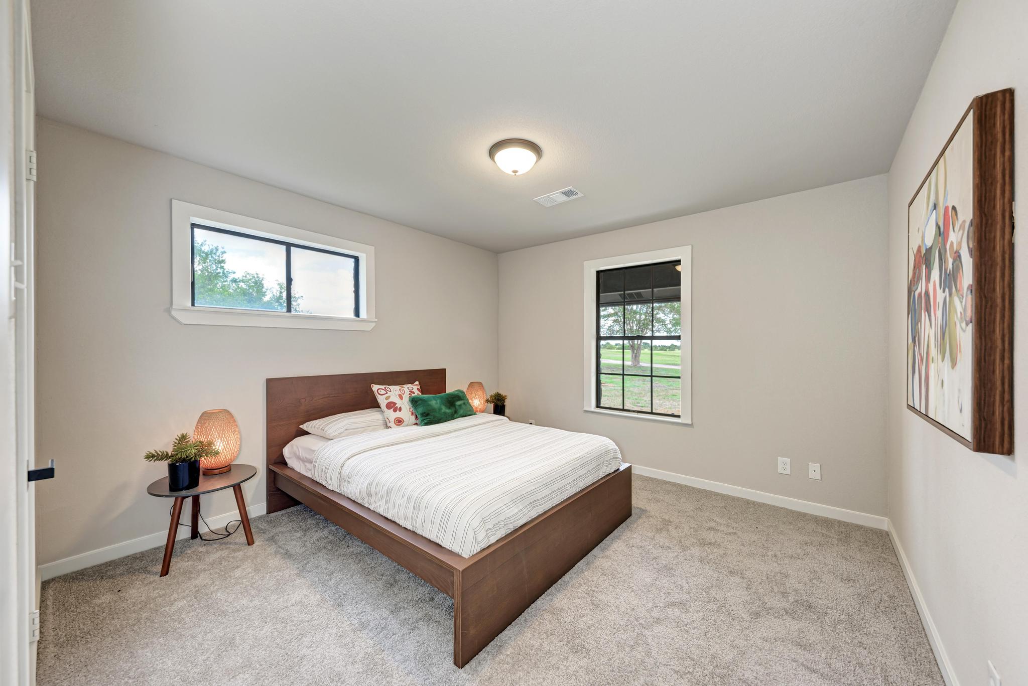 2365 Hackberry Road Salado, TX 76571 - Photo 26 of 40 a bedroom with a bed and a window