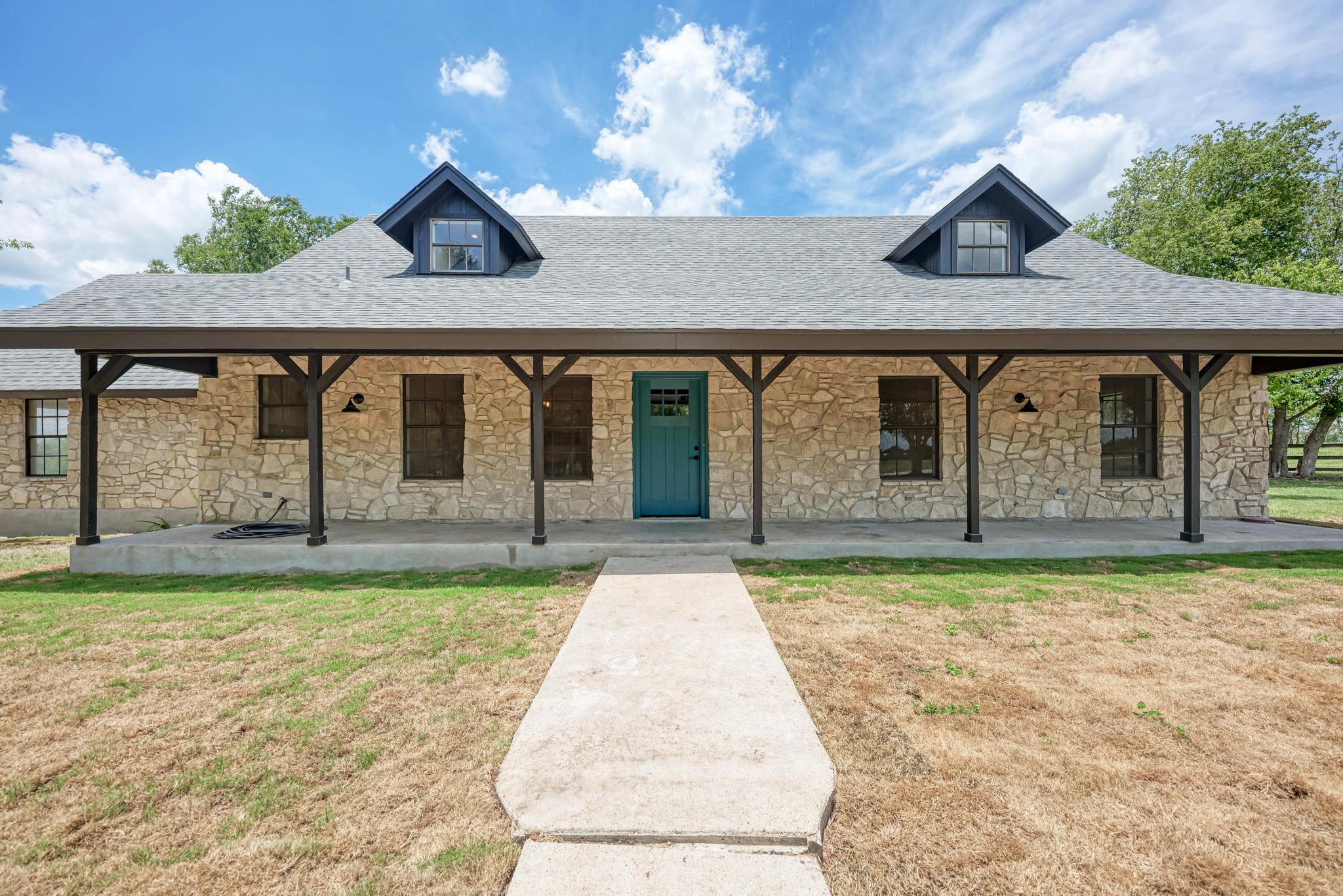 2365 Hackberry Road Salado, TX 76571 - Photo 8 of 40 front view of a house with a yard