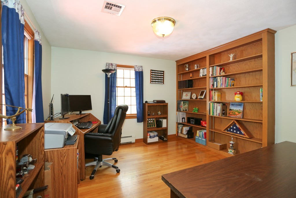 28 Middle Road Sudbury, MA 01776 - Photo 15 of 24 a view of a workspace with furniture and toys