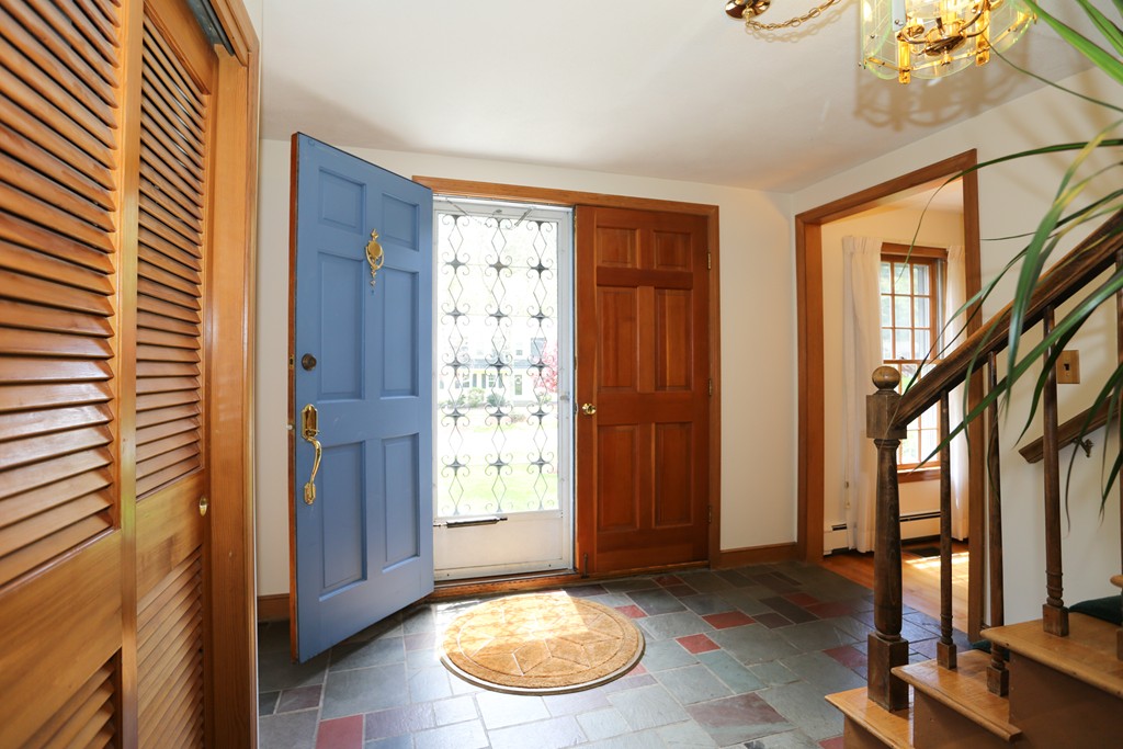 28 Middle Road Sudbury, MA 01776 - Photo 8 of 24 a view of a livingroom with furniture and staircase