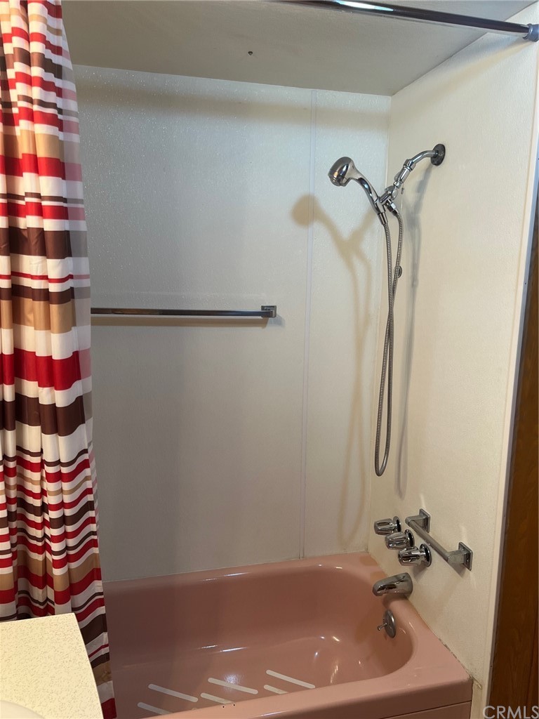 13645 5th Street, Unit 35 Yucaipa, CA 92399 - Photo 12 of 22 a bathroom with a sink and a shower