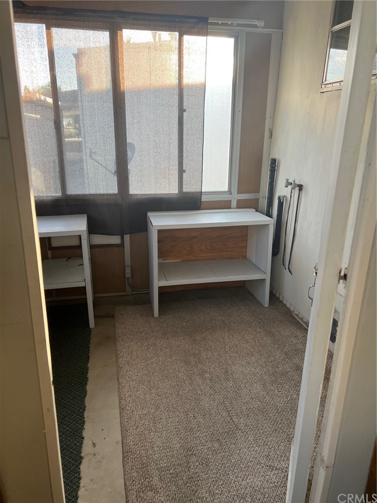 13645 5th Street, Unit 35 Yucaipa, CA 92399 - Photo 17 of 22 a bathroom with a bathtub and large window