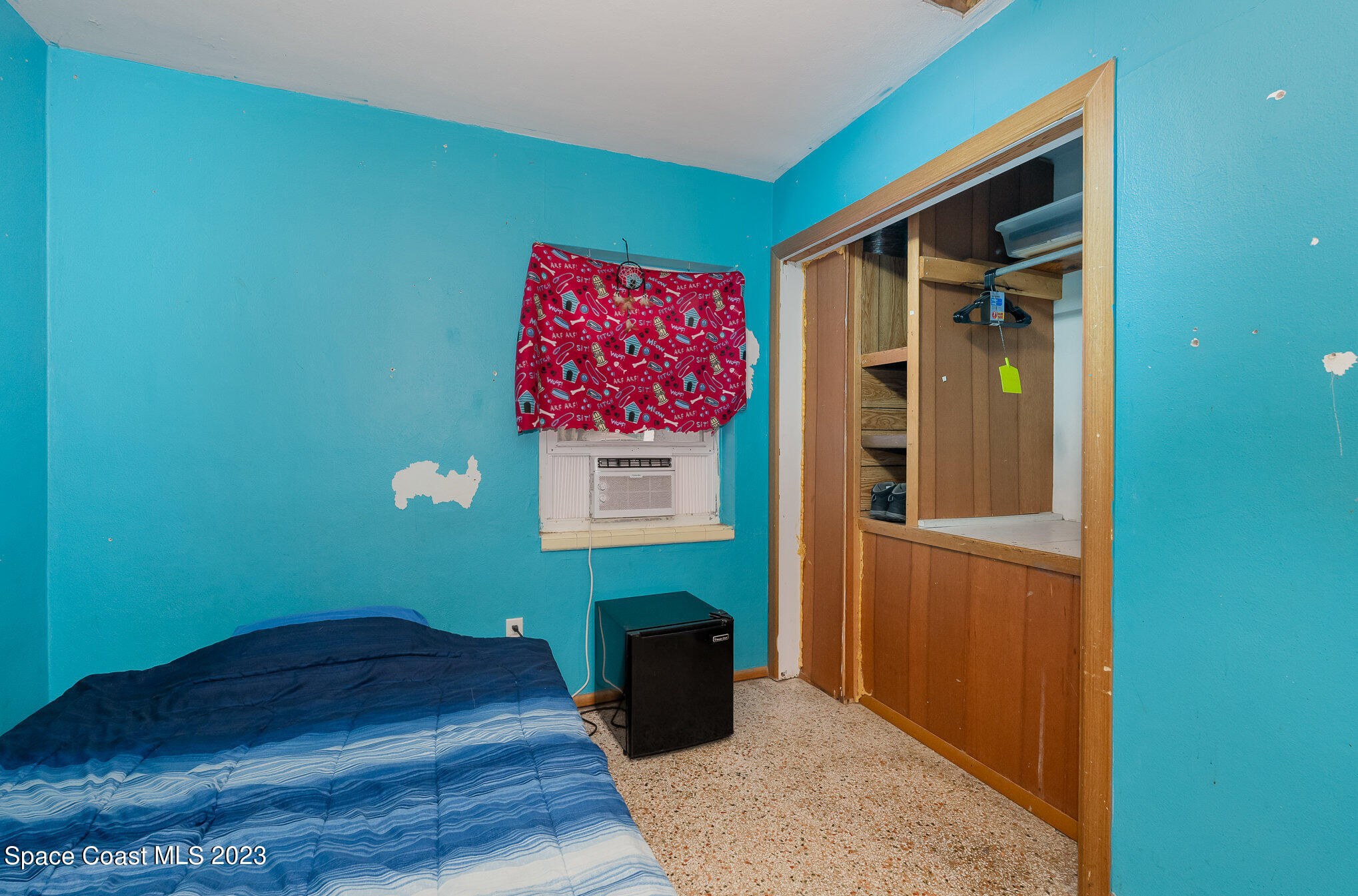 109 Cherry Street Melbourne, FL 32901 - Photo 11 of 31 a bedroom with a bed and a dresser